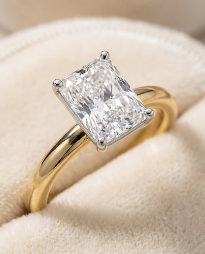 The Floria Comfort Fit Claw Prong Solitaire Radiant Cut Engagement Ring Setting in 18K Yellow Gold