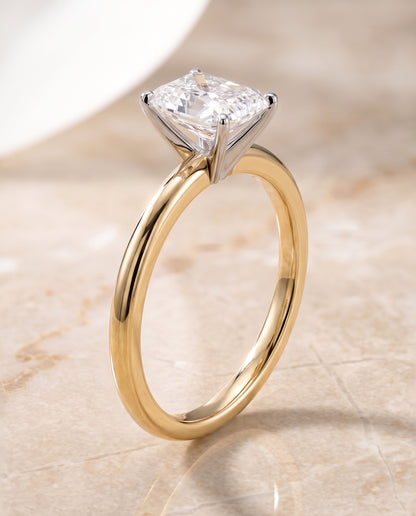 The Floria Comfort Fit Claw Prong Solitaire Radiant Cut Engagement Ring Setting in 18K Yellow Gold