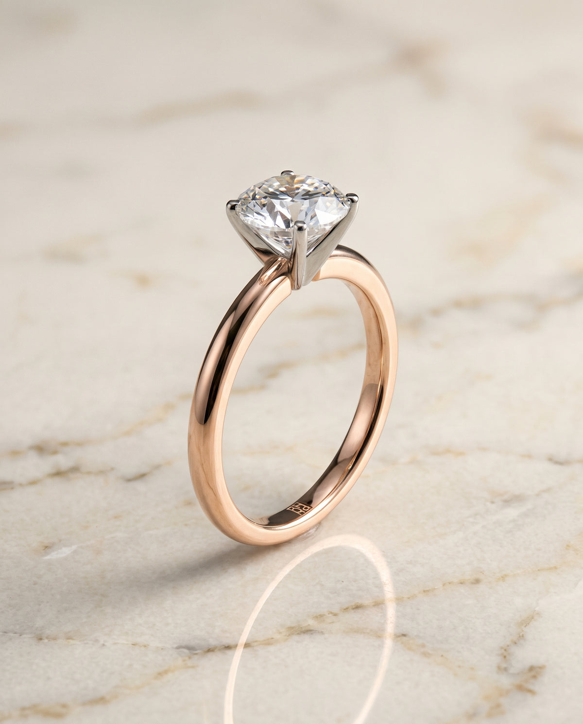The Floria Comfort Fit Claw Prong Solitaire Round Engagement Ring Setting in 14K Rose Gold