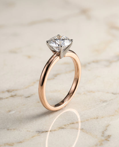 The Floria Comfort Fit Claw Prong Solitaire Round Engagement Ring Setting in 14K Rose Gold