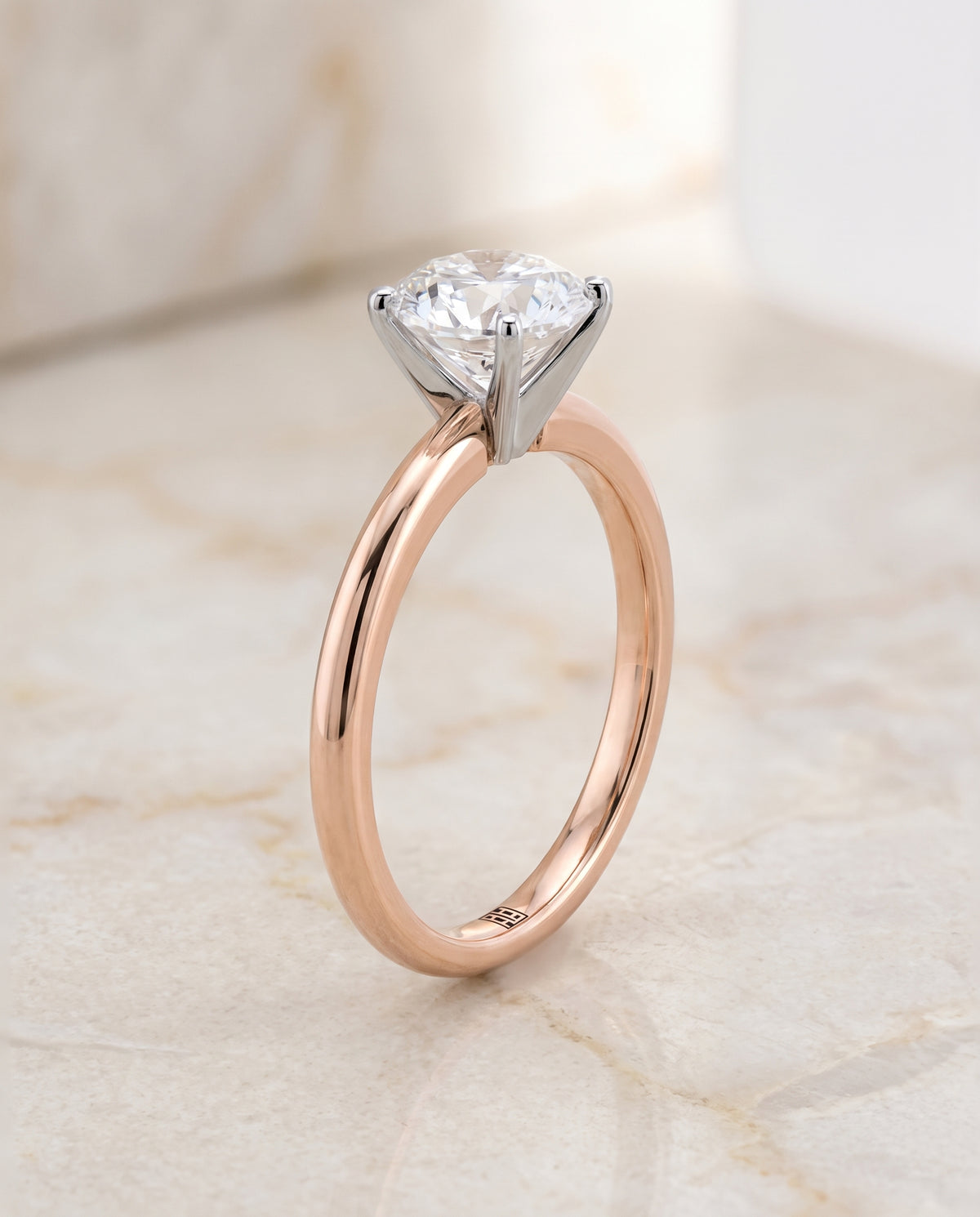 The Floria Comfort Fit Claw Prong Solitaire Round Engagement Ring Setting in 14K Rose Gold