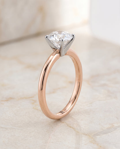 The Floria Comfort Fit Claw Prong Solitaire Round Engagement Ring Setting in 14K Rose Gold