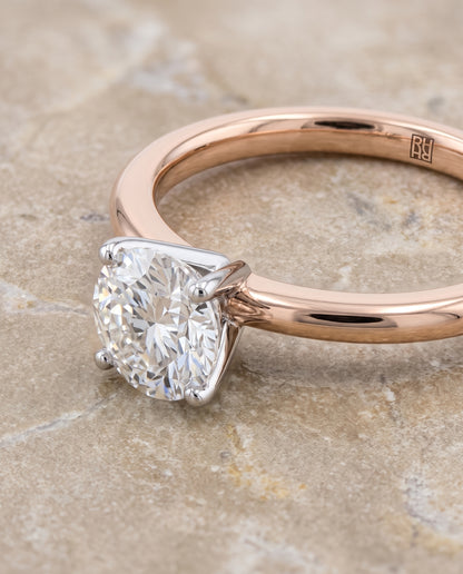 The Floria Comfort Fit Claw Prong Solitaire Round Engagement Ring Setting in 14K Rose Gold