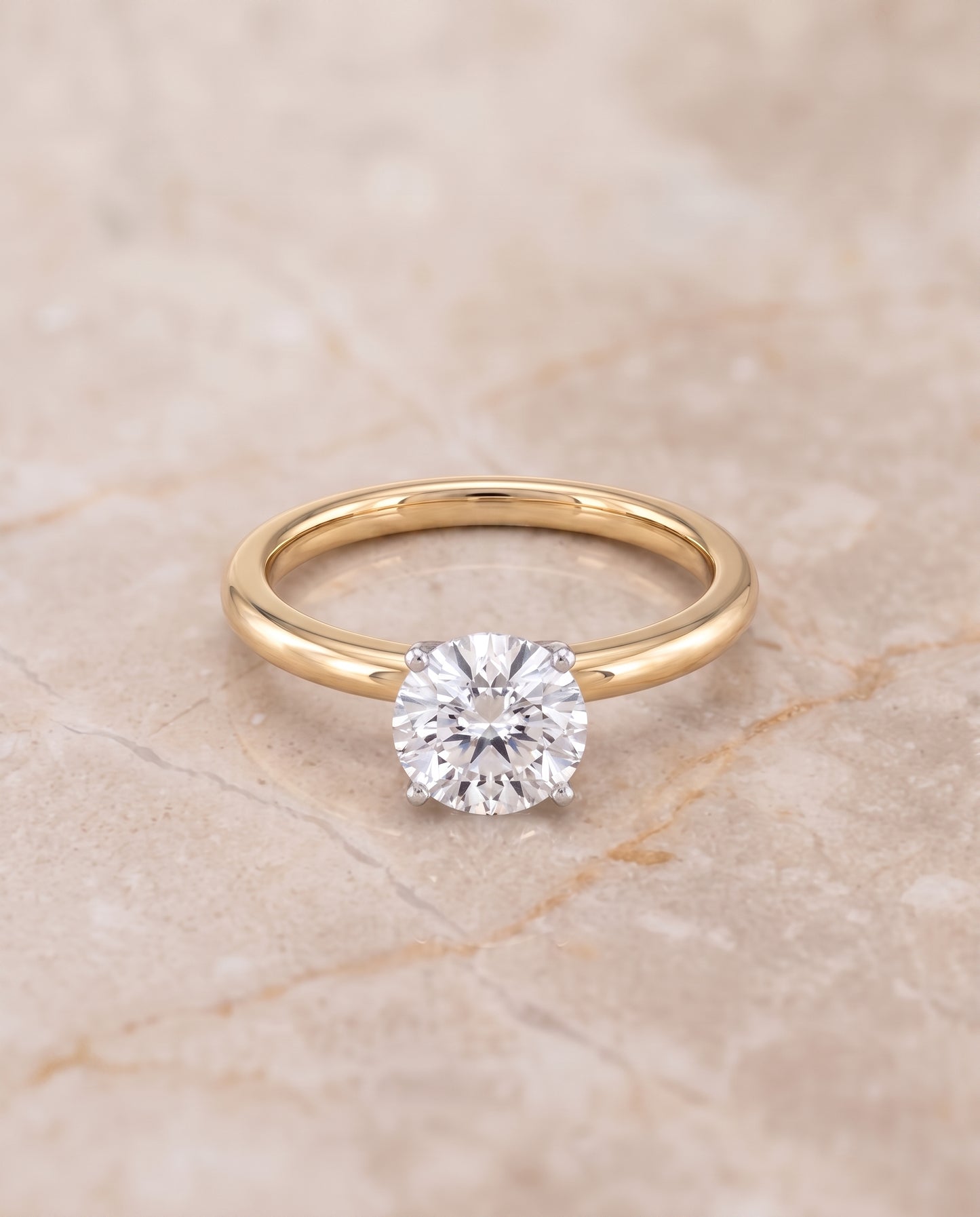 The Floria Comfort Fit Claw Prong Solitaire Round Engagement Ring Setting in 18K Yellow Gold