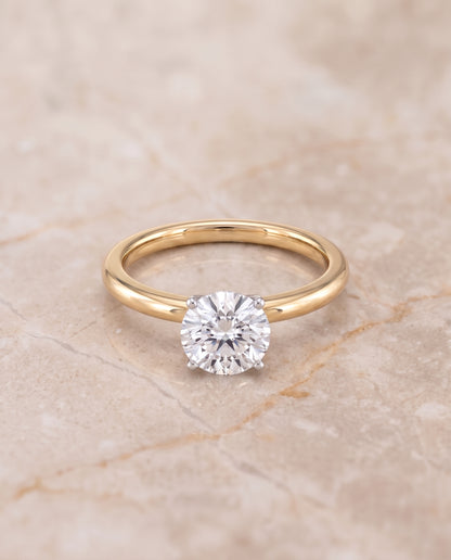 The Floria Comfort Fit Claw Prong Solitaire Round Engagement Ring Setting in 18K Yellow Gold