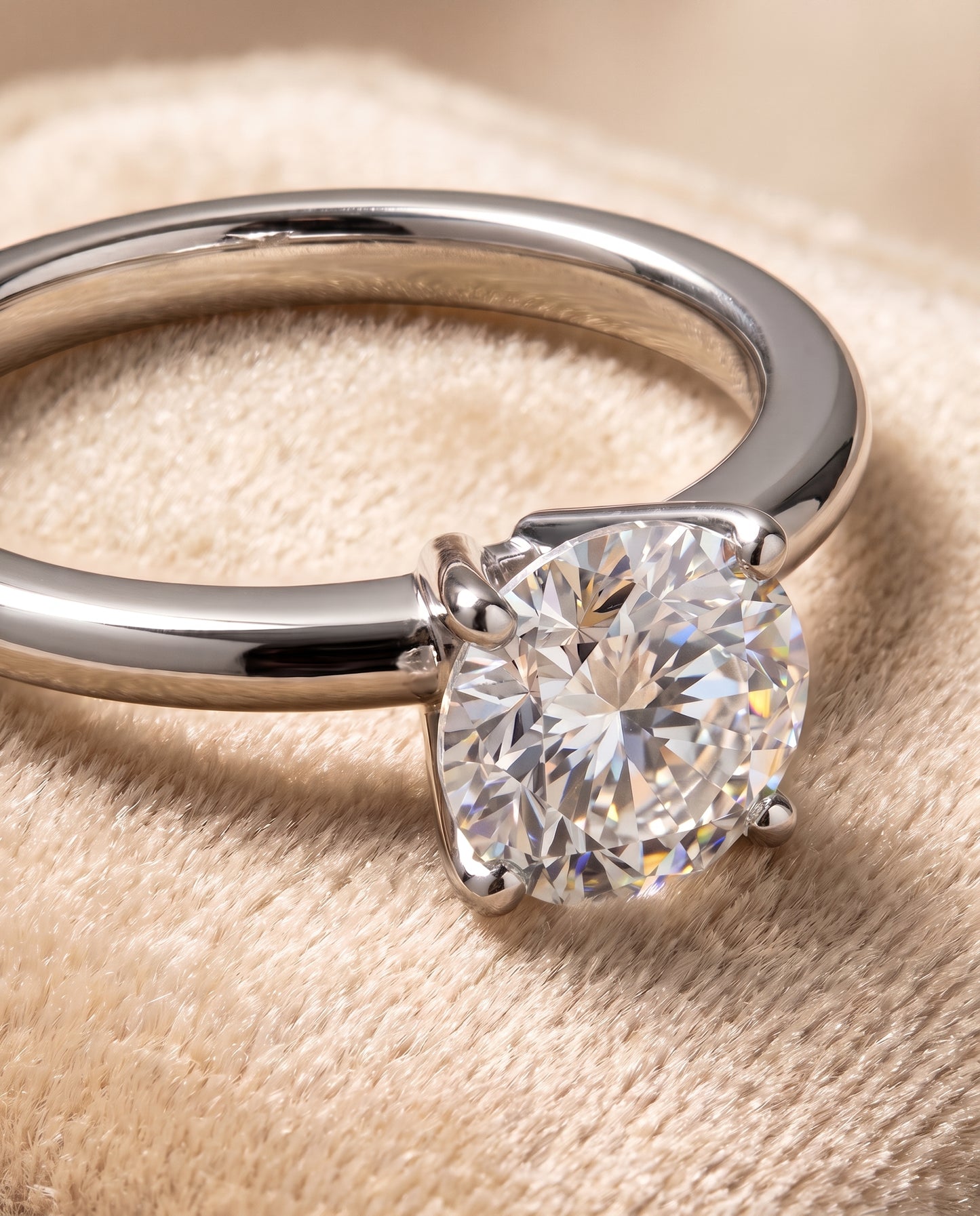 The Floria Comfort Fit Claw Prong Solitaire Round Engagement Ring Setting in Platinum