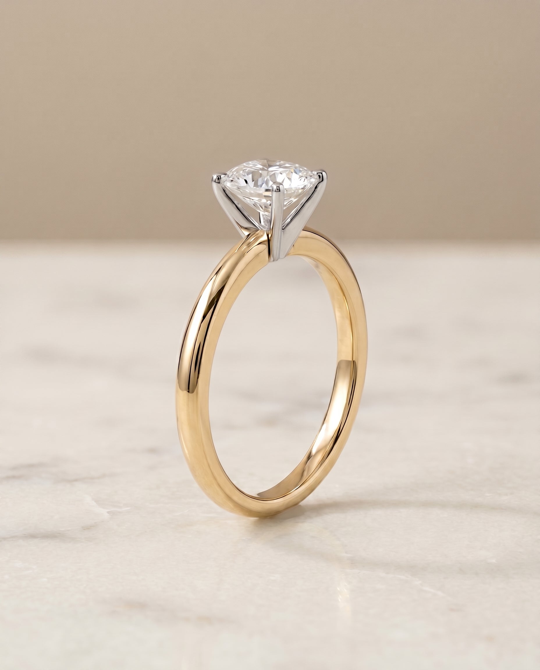 Comfort Fit Claw Prong Solitaire Cut styling on The Floria cushion engagement ring setting | RockHer