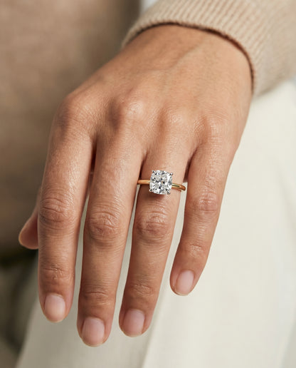 The Floria Comfort Fit Claw Prong Solitaire Cushion Cut Engagement Ring Setting in 18K Yellow Gold