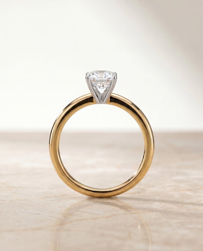 The Floria Comfort Fit Claw Prong Solitaire Cushion Cut Engagement Ring Setting in 18K Yellow Gold
