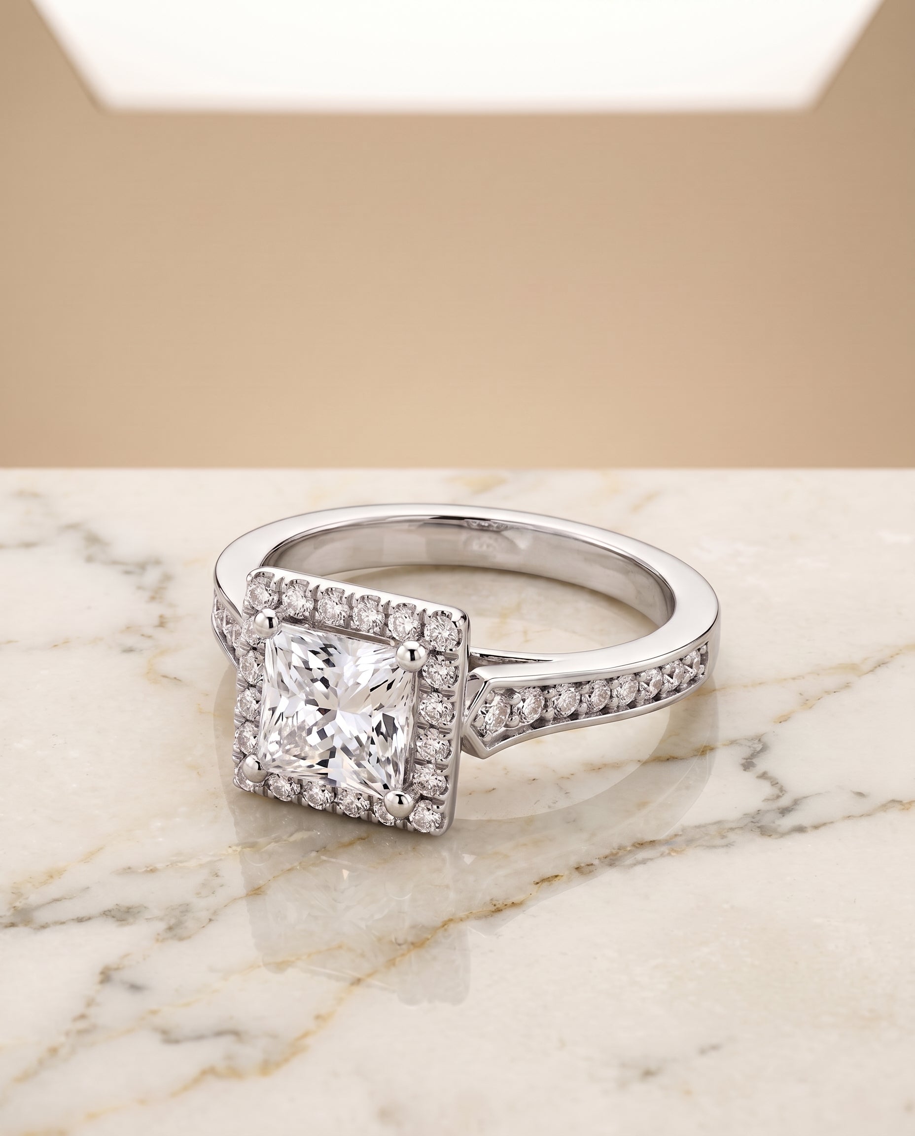 The Genesis Channel Pavé Halo Princess Cut Engagement Ring Setting in Platinum