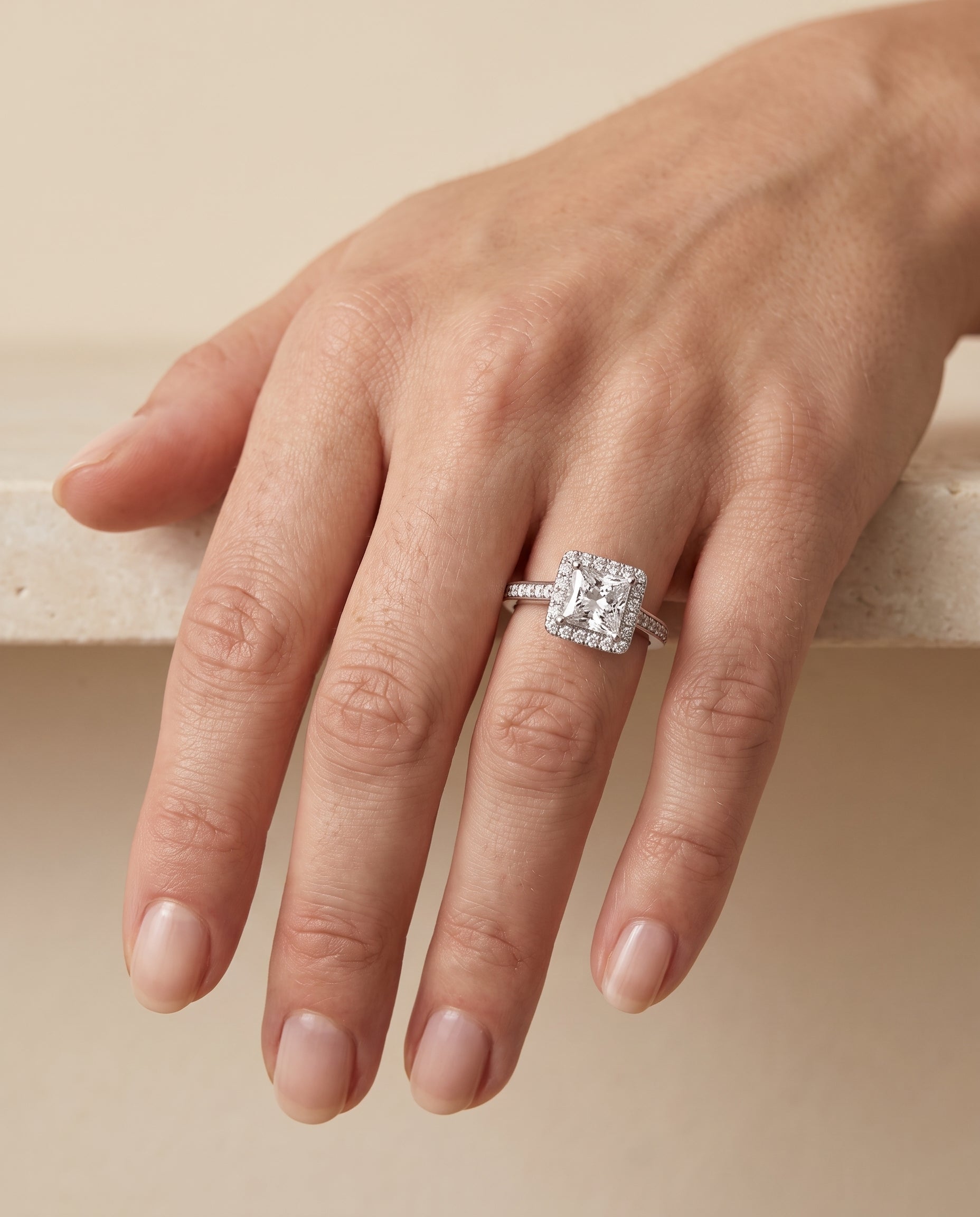 The Genesis engagement ring setting in Platinum, channel pavé halo design | RockHer