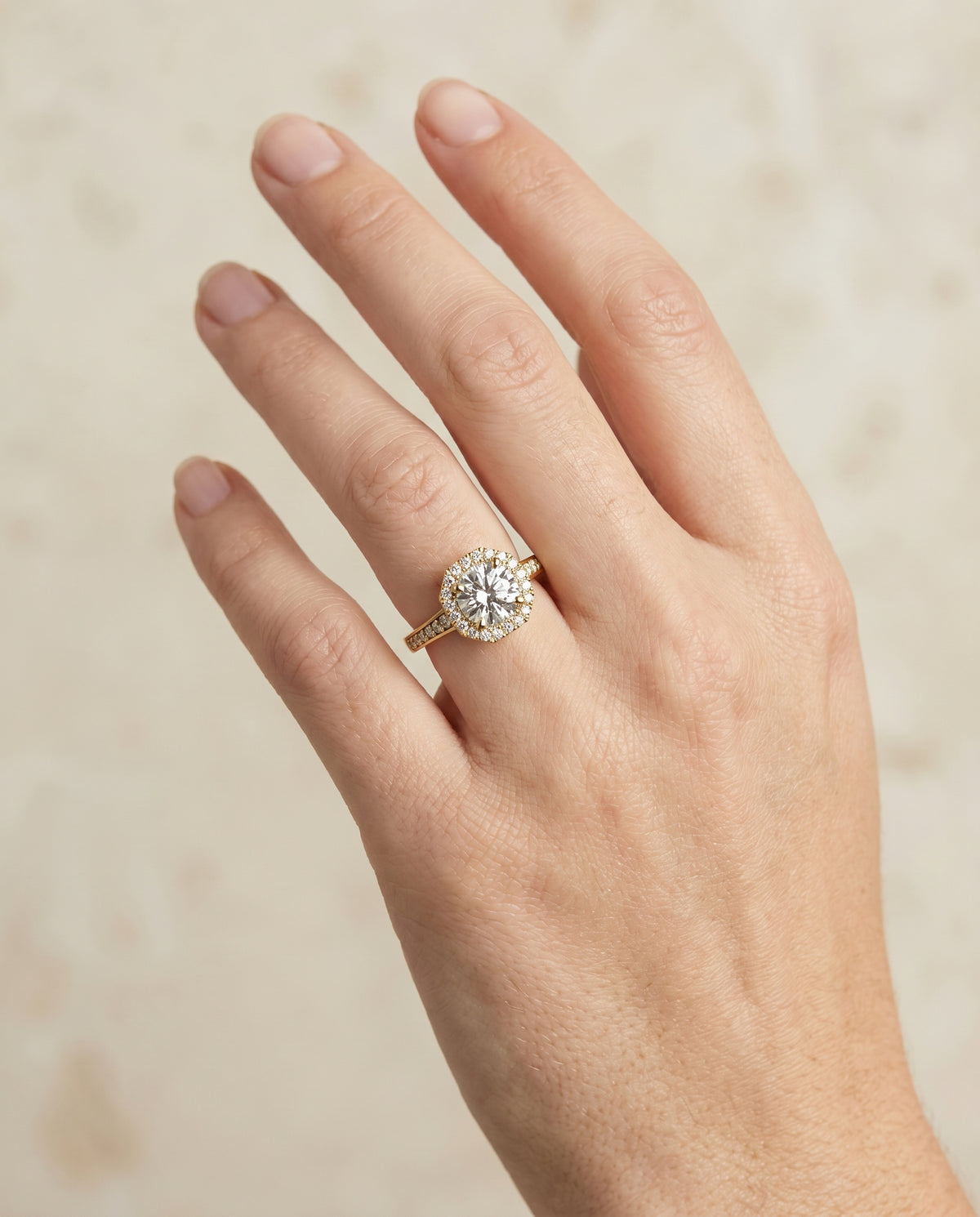 The Genesis engagement ring setting in 18K Yellow Gold, channel pavé halo design | RockHer