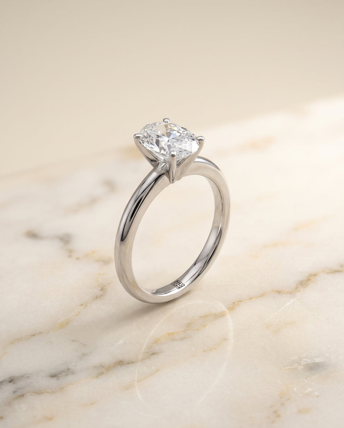 The Gilda Five Prong Comfort Fit Claw Solitaire Oval Engagement Ring Setting in Platinum