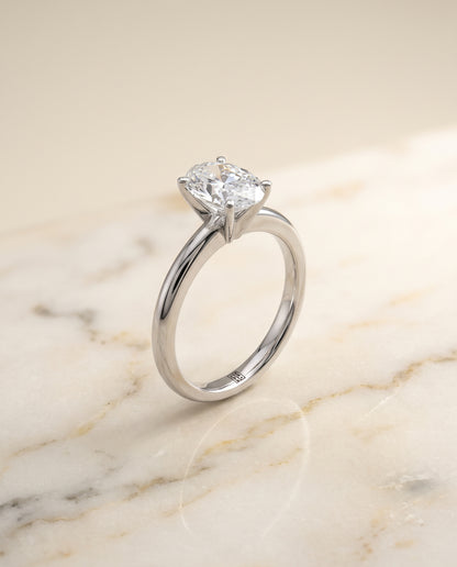 The Gilda Five Prong Comfort Fit Claw Solitaire Oval Engagement Ring Setting in Platinum