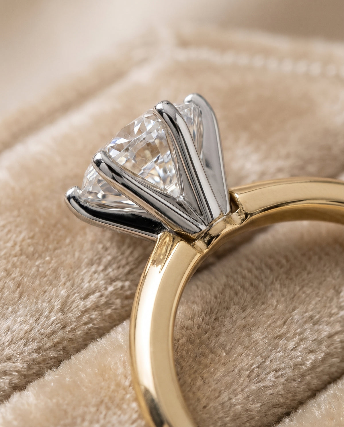 The Giovanna Pinched Comfort Fit Claw Prong Solitaire Round Engagement Ring Setting in 18K Yellow Gold