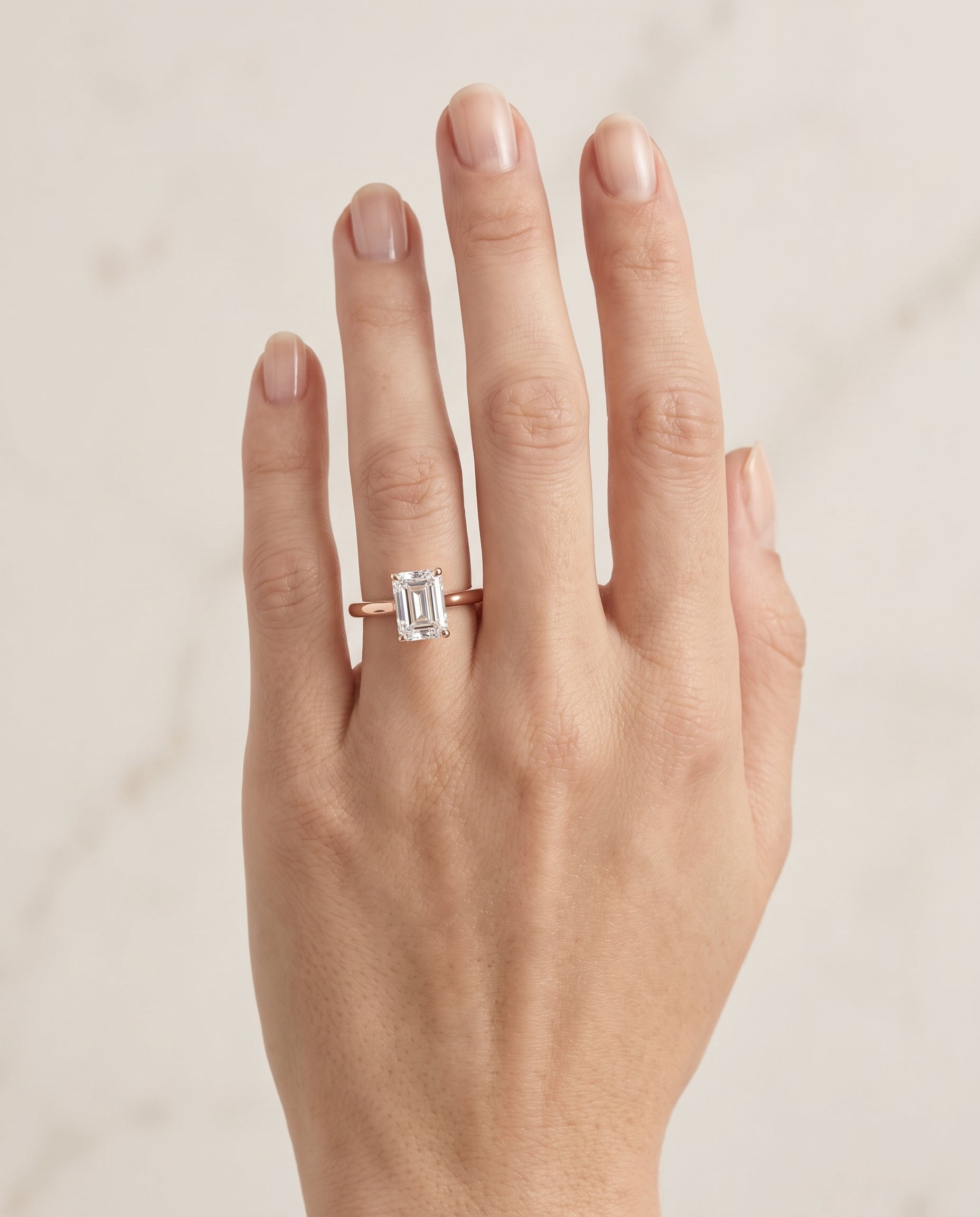 The Gladys Pinched Cathedral Solitaire Emerald Cut Engagement Ring Setting in 14K Rose Gold