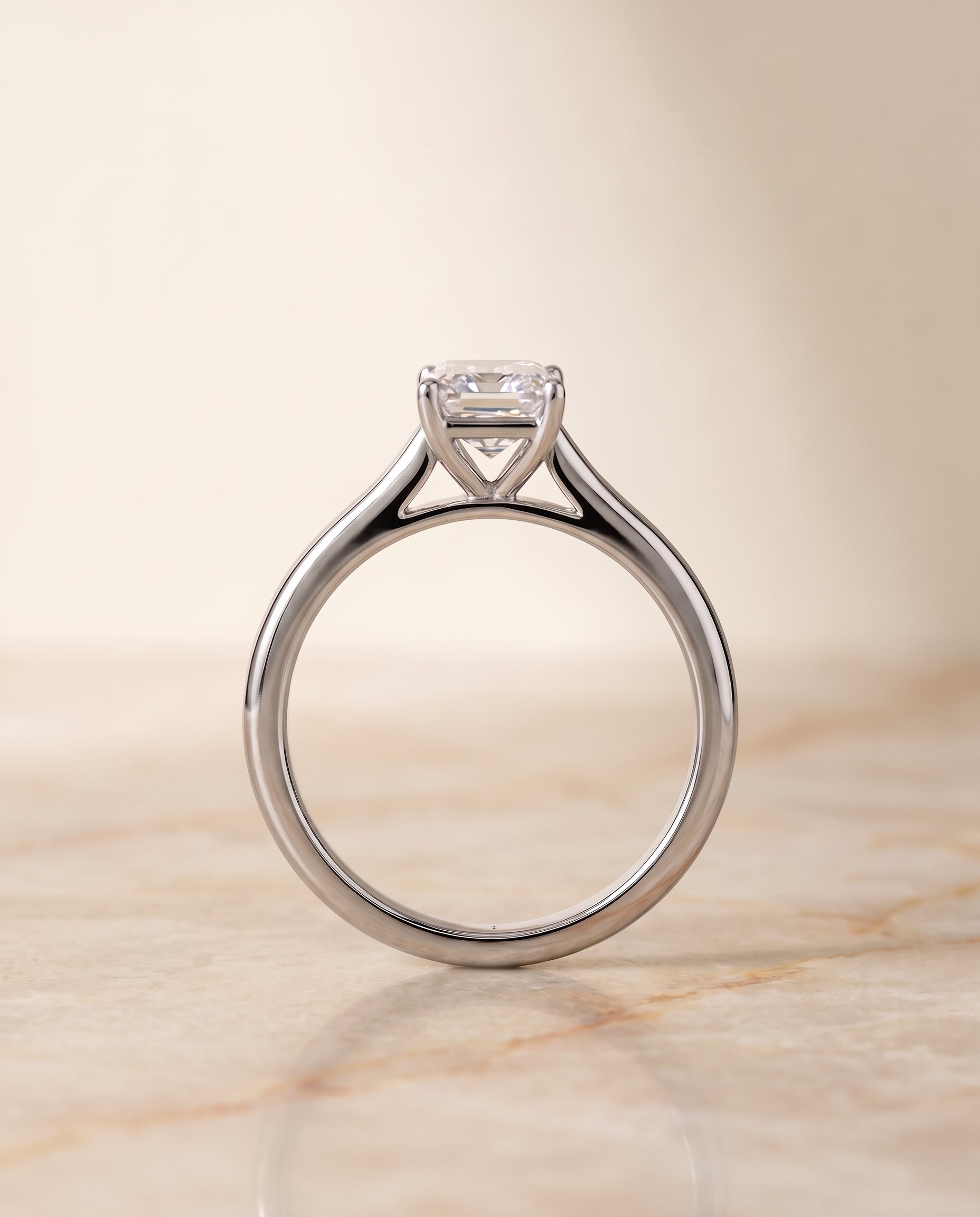 Pinched Cathedral Solitaire Cut styling on The Gladys emerald engagement ring setting | RockHer