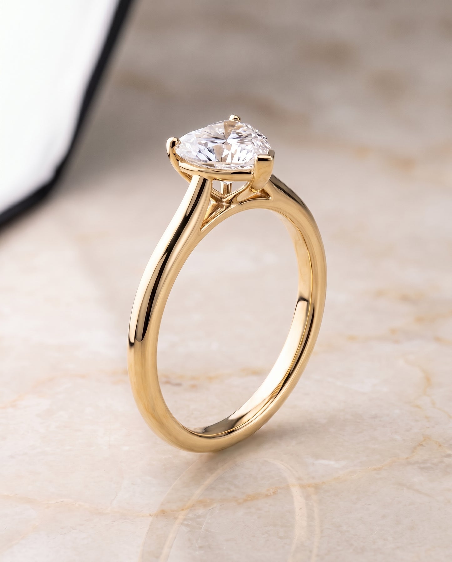 The Gladys Pinched Cathedral Solitaire Heart Engagement Ring Setting in 18K Yellow Gold