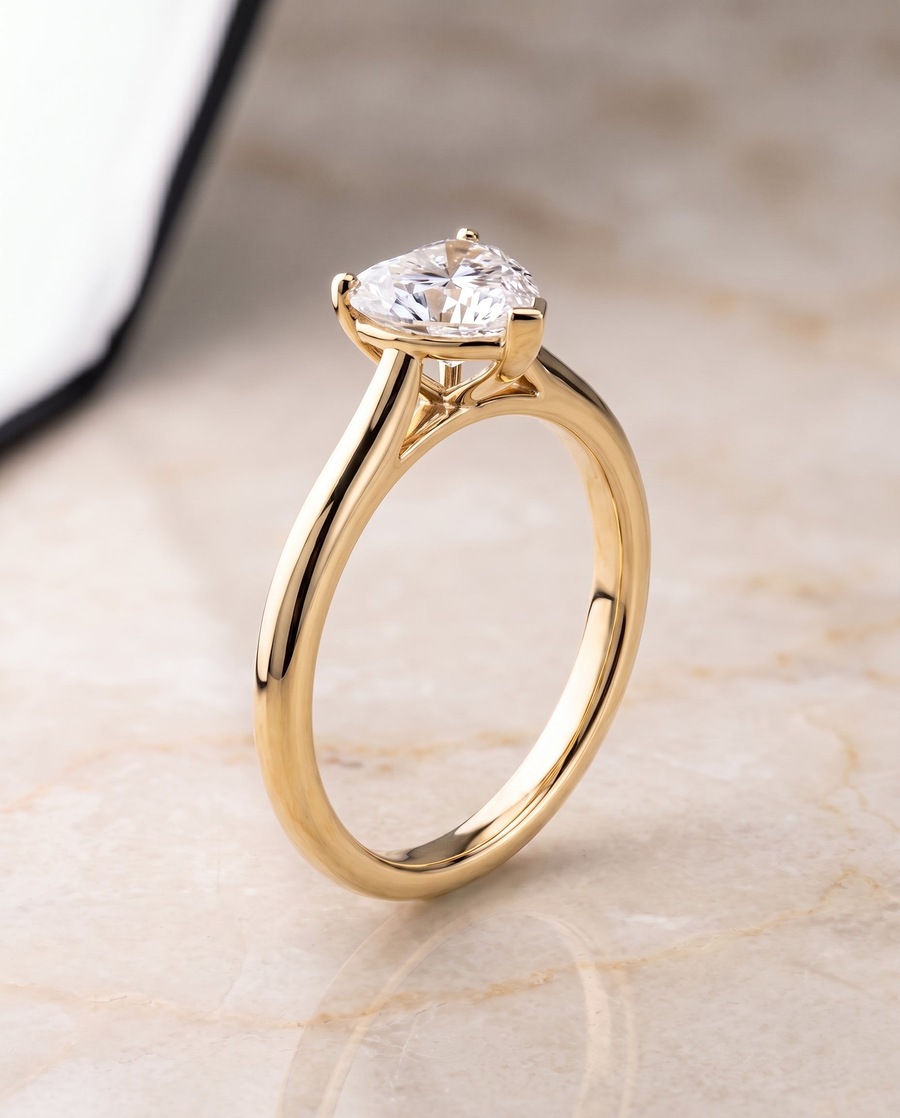 The Gladys Pinched Cathedral Solitaire Heart Engagement Ring Setting in 18K Yellow Gold