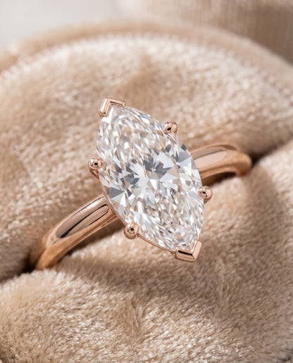 The Gladys Pinched Cathedral Solitaire Marquise Engagement Ring Setting in 14K Rose Gold
