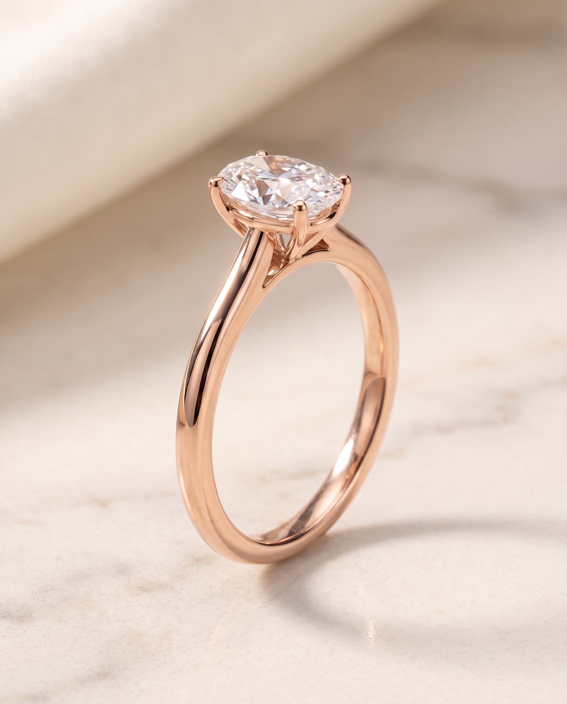 The Gladys Pinched Cathedral Solitaire Oval Engagement Ring Setting in 14K Rose Gold