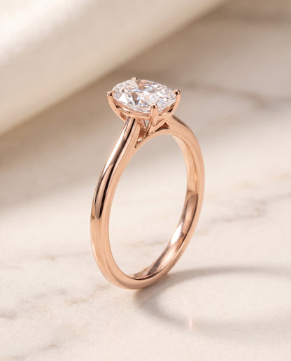 The Gladys Pinched Cathedral Solitaire Oval Engagement Ring Setting in 14K Rose Gold