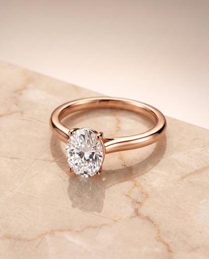 The Gladys Pinched Cathedral Solitaire Oval Engagement Ring Setting in 14K Rose Gold