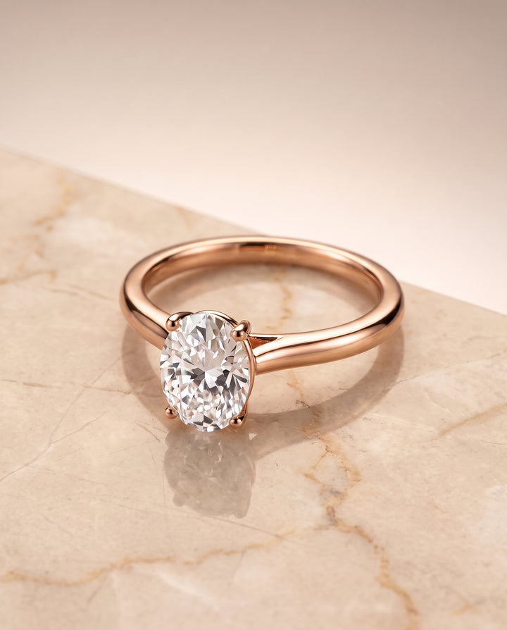 The Gladys Pinched Cathedral Solitaire Oval Engagement Ring Setting in 14K Rose Gold
