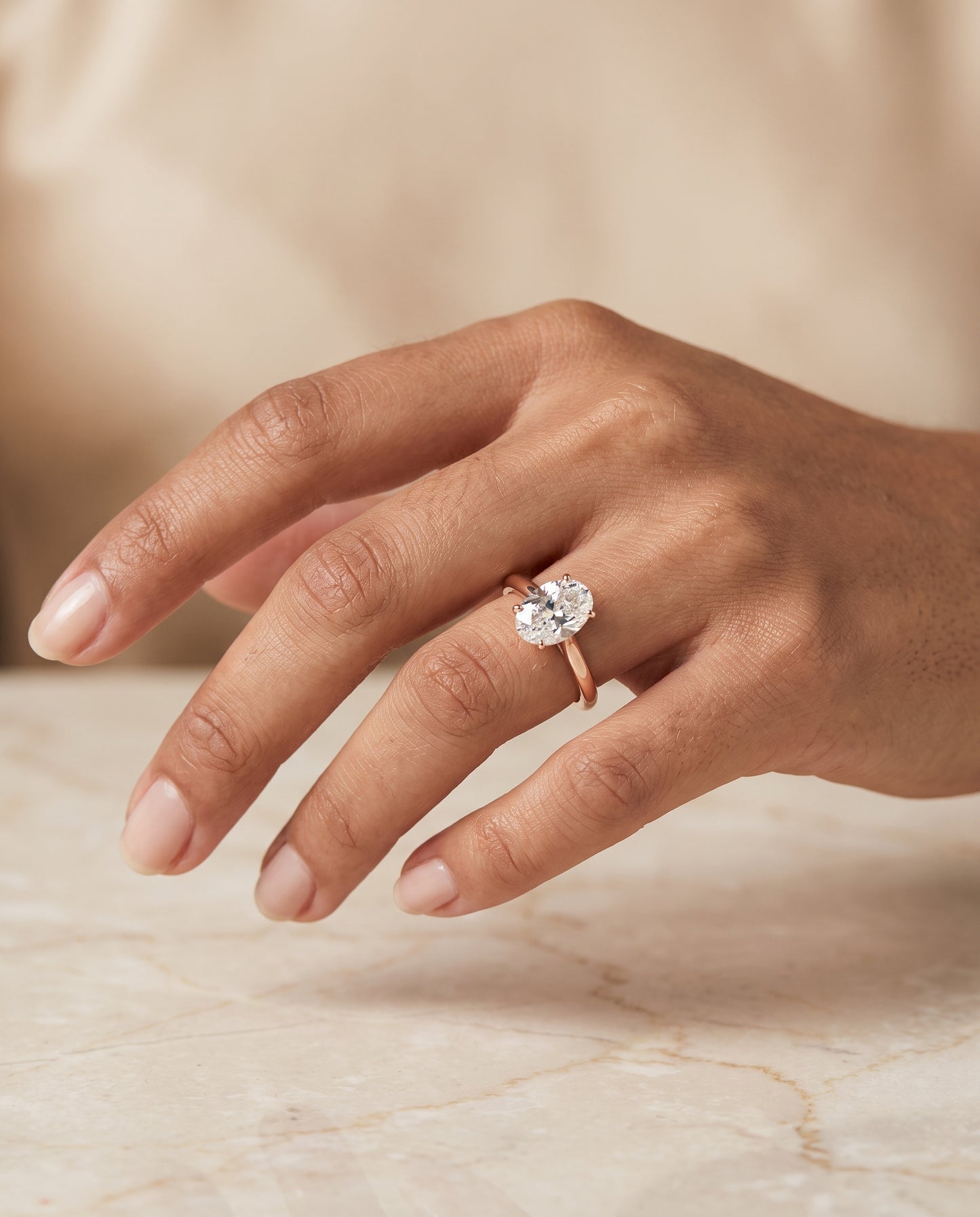 The Gladys Pinched Cathedral Solitaire Oval Engagement Ring Setting in 14K Rose Gold