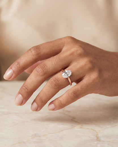 The Gladys Pinched Cathedral Solitaire Oval Engagement Ring Setting in 14K Rose Gold