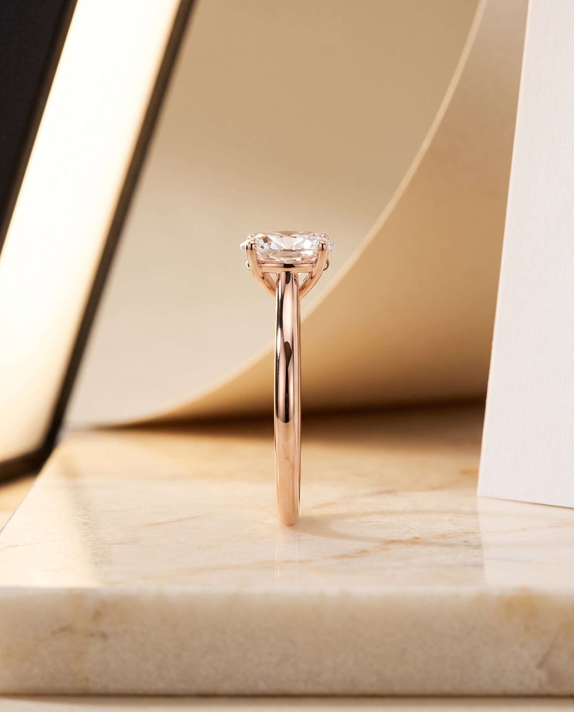 The Gladys Pinched Cathedral Solitaire Oval Engagement Ring Setting in 14K Rose Gold