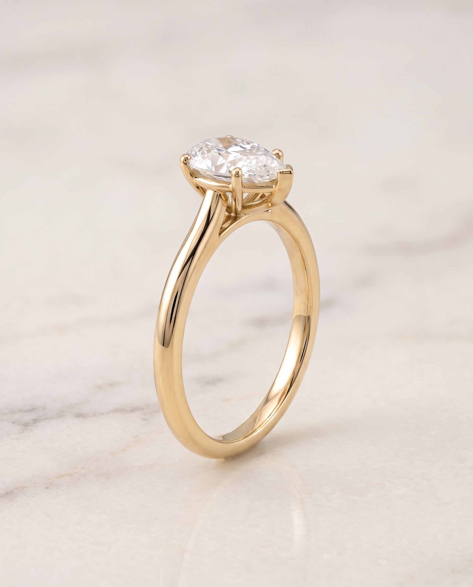 Pinched Cathedral Solitaire styling on The Gladys pear engagement ring setting | RockHer