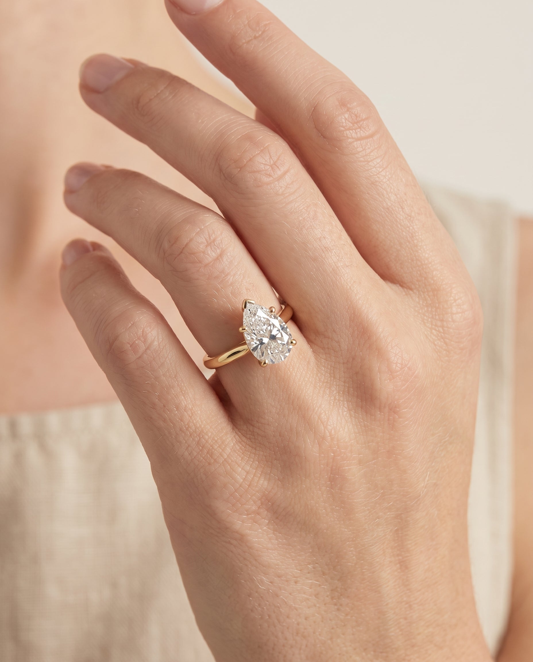 The Gladys engagement ring setting in 18K Yellow Gold, pinched cathedral solitaire design | RockHer