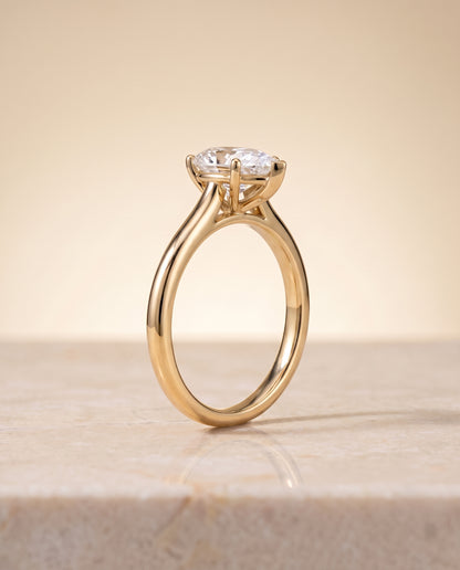The Gladys Pinched Cathedral Solitaire Pear Engagement Ring Setting in 18K Yellow Gold