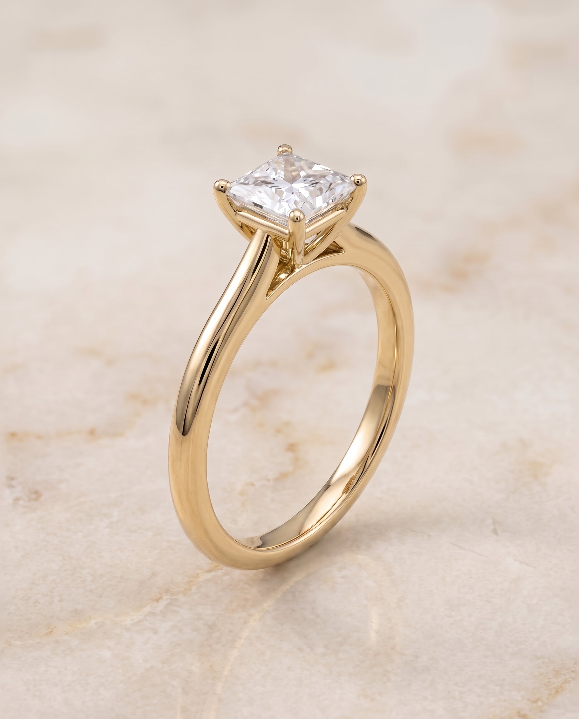 The Gladys Pinched Cathedral Solitaire Princess Cut Engagement Ring Setting in 18K Yellow Gold