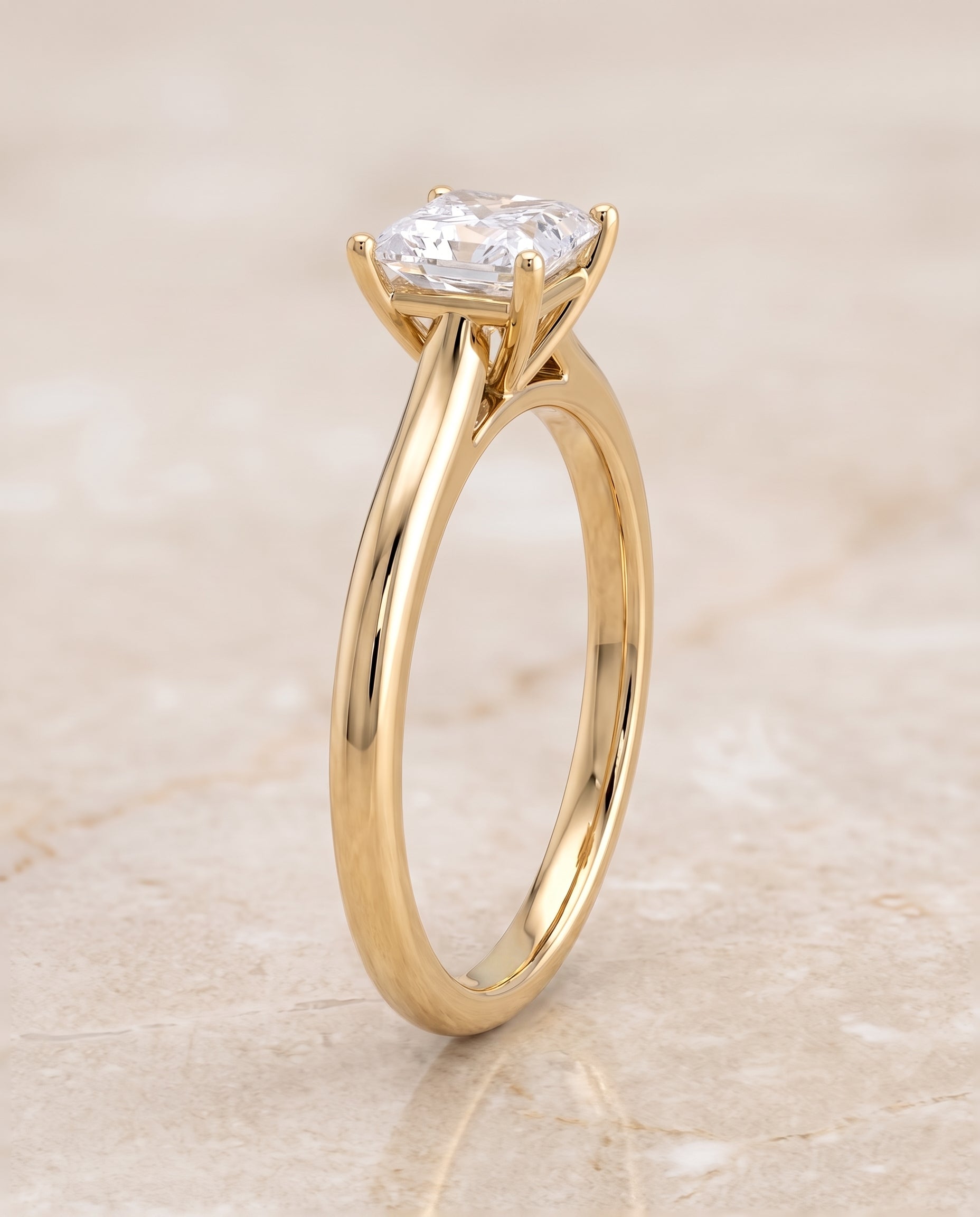 The Gladys Pinched Cathedral Solitaire Princess Cut Engagement Ring Setting in 18K Yellow Gold