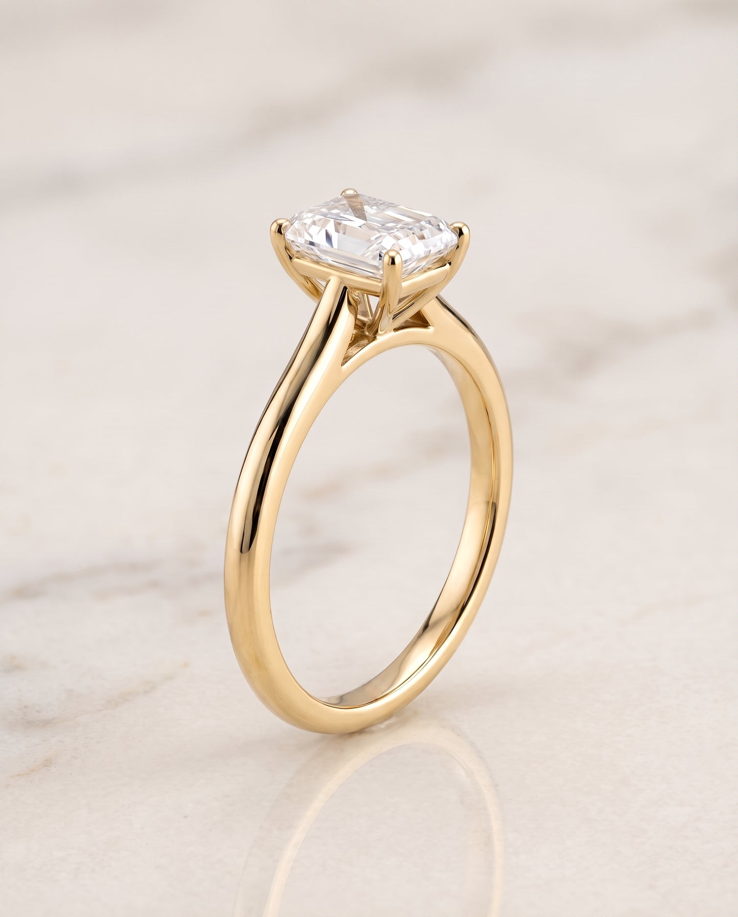 The Gladys Pinched Cathedral Solitaire Radiant Cut Engagement Ring Setting in 18K Yellow Gold