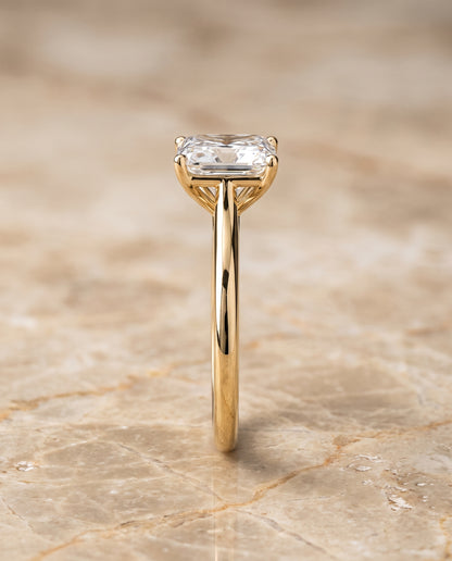 The Gladys Pinched Cathedral Solitaire Radiant Cut Engagement Ring Setting in 18K Yellow Gold