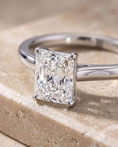 The Gladys Pinched Cathedral Solitaire Radiant Cut Engagement Ring Setting in 18K White Gold