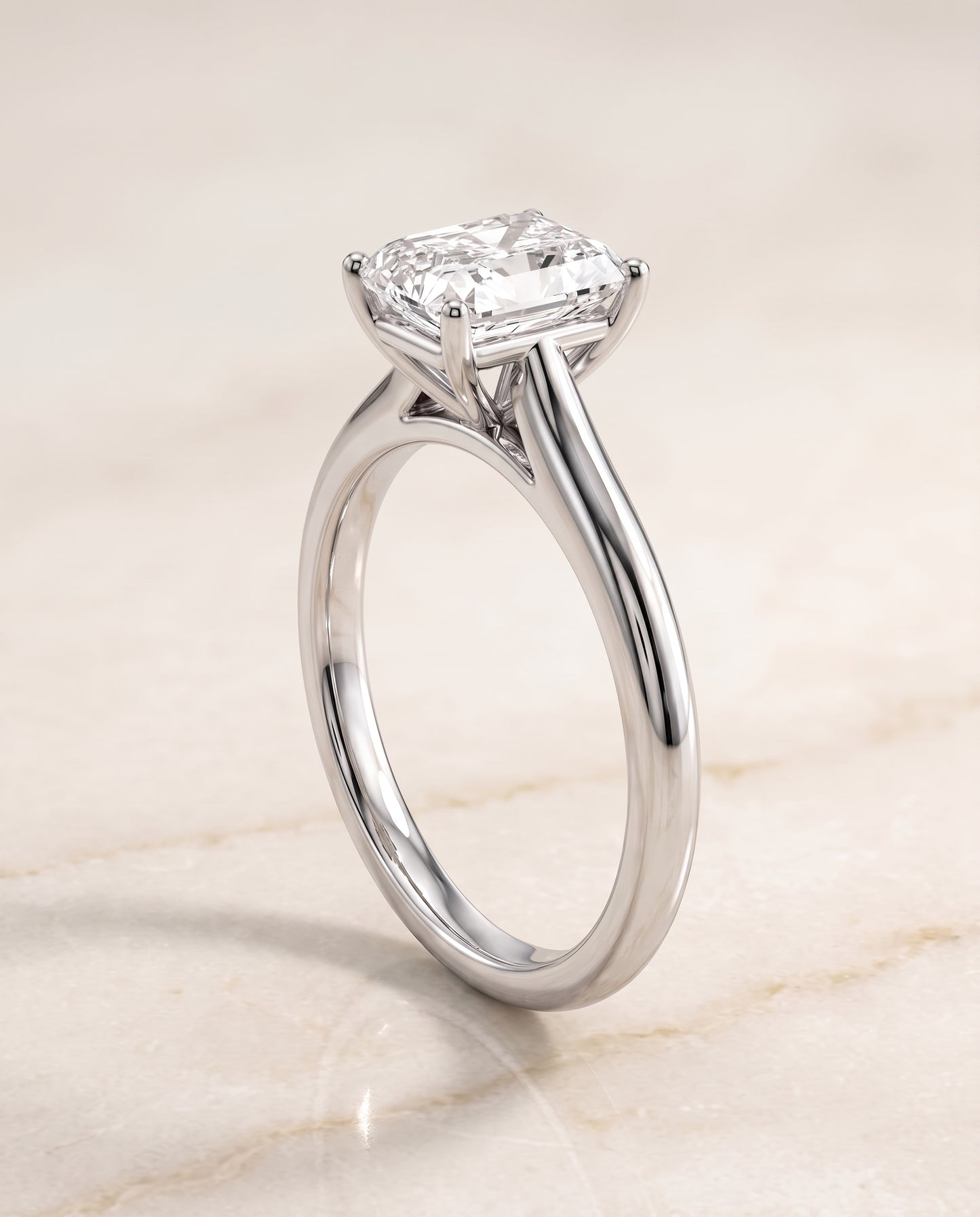 The Gladys Pinched Cathedral Solitaire Radiant Cut Engagement Ring Setting in 18K White Gold