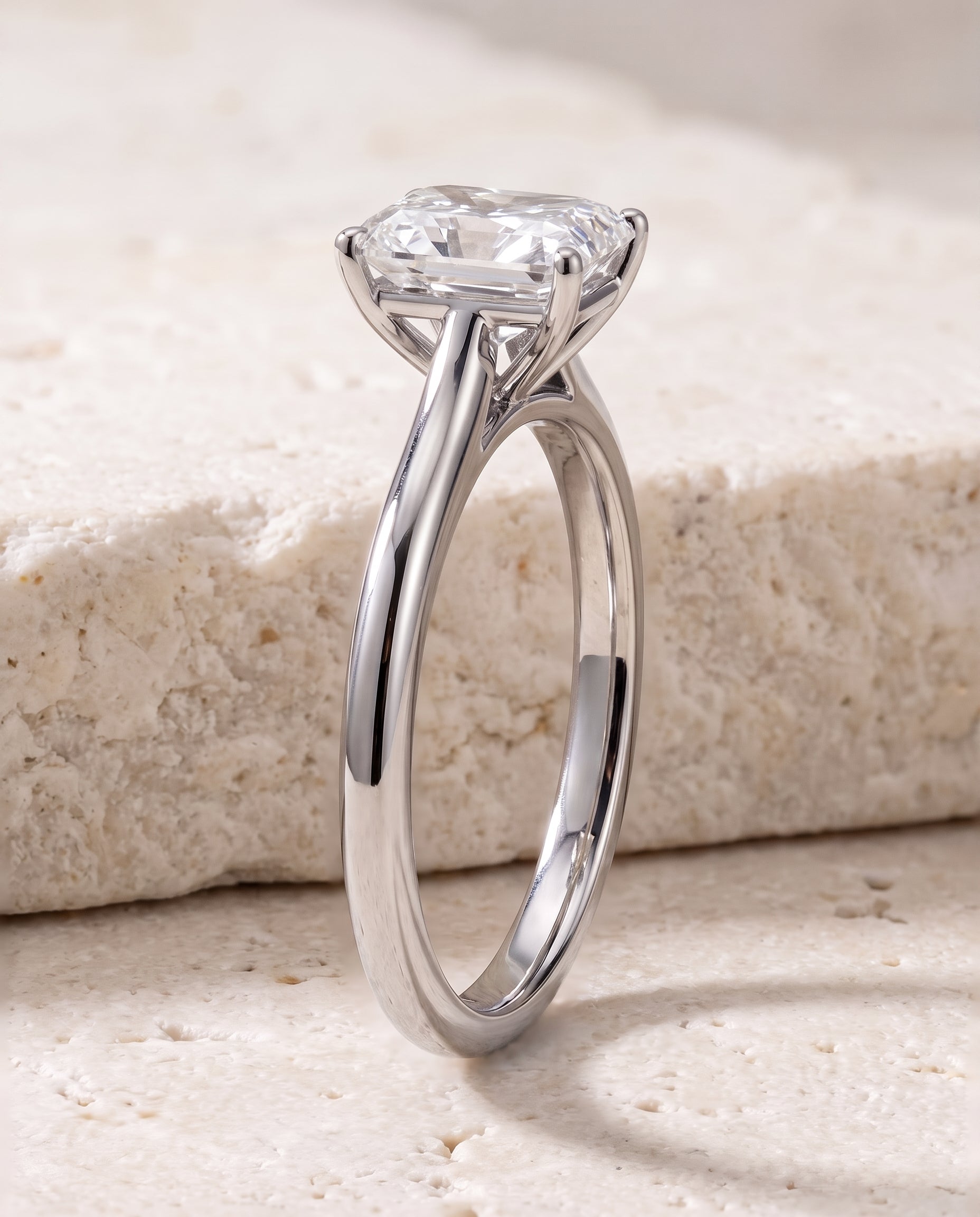 The Gladys Pinched Cathedral Solitaire Radiant Cut Engagement Ring Setting in 18K White Gold