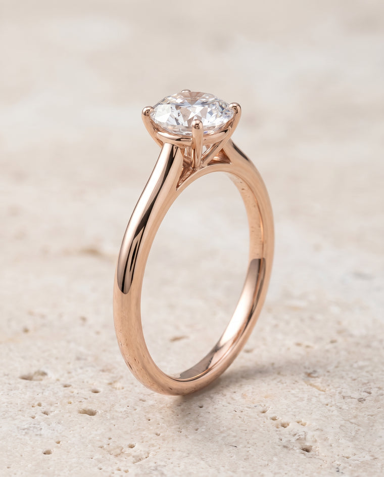 The Gladys Pinched Cathedral Solitaire Round Engagement Ring Setting in 14K Rose Gold