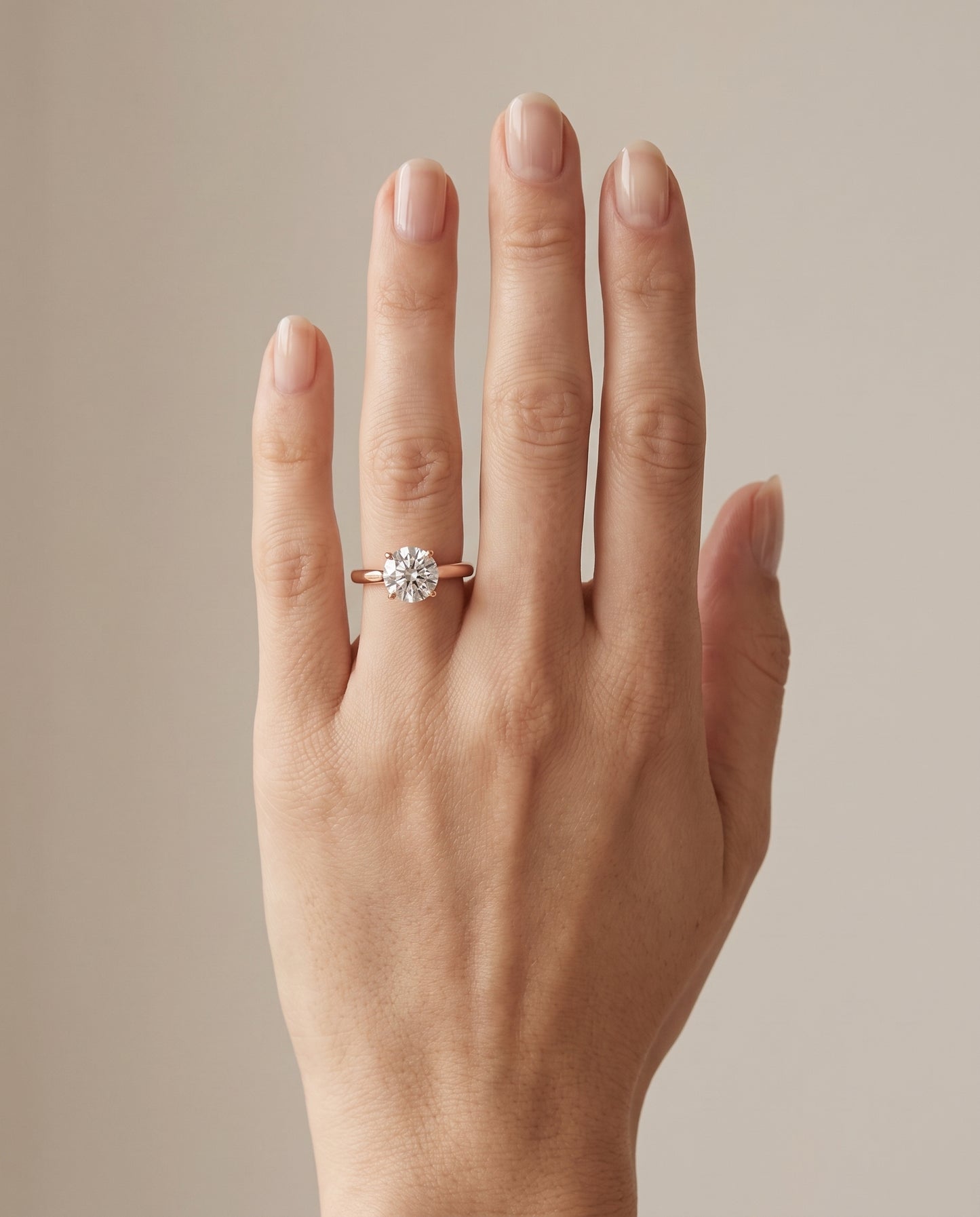 The Gladys Pinched Cathedral Solitaire Round Engagement Ring Setting in 14K Rose Gold