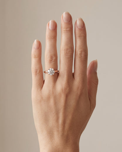 The Gladys Pinched Cathedral Solitaire Round Engagement Ring Setting in 14K Rose Gold