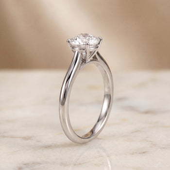 The Gladys Pinched Cathedral Solitaire Round Engagement Ring Setting in Platinum