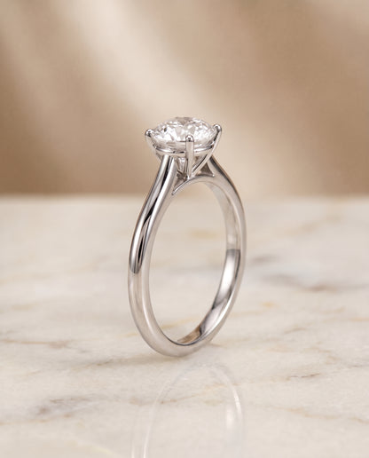 The Gladys Pinched Cathedral Solitaire Round Engagement Ring Setting in Platinum