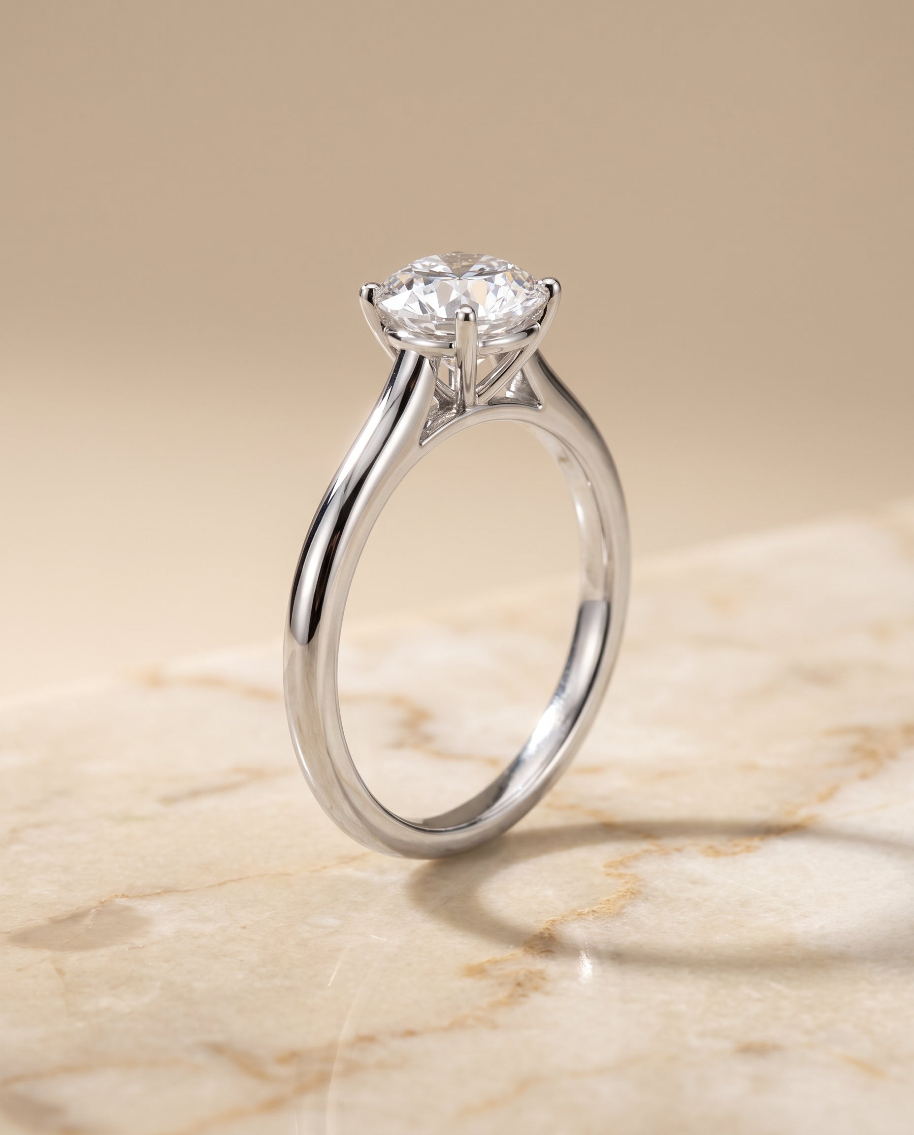 The Gladys setting for round diamonds, made to order in Platinum | RockHer