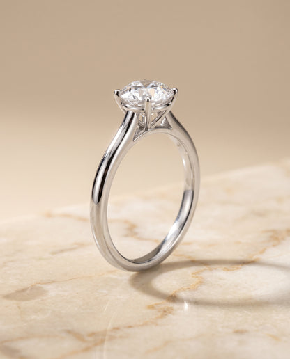 The Gladys Pinched Cathedral Solitaire Round Engagement Ring Setting in Platinum