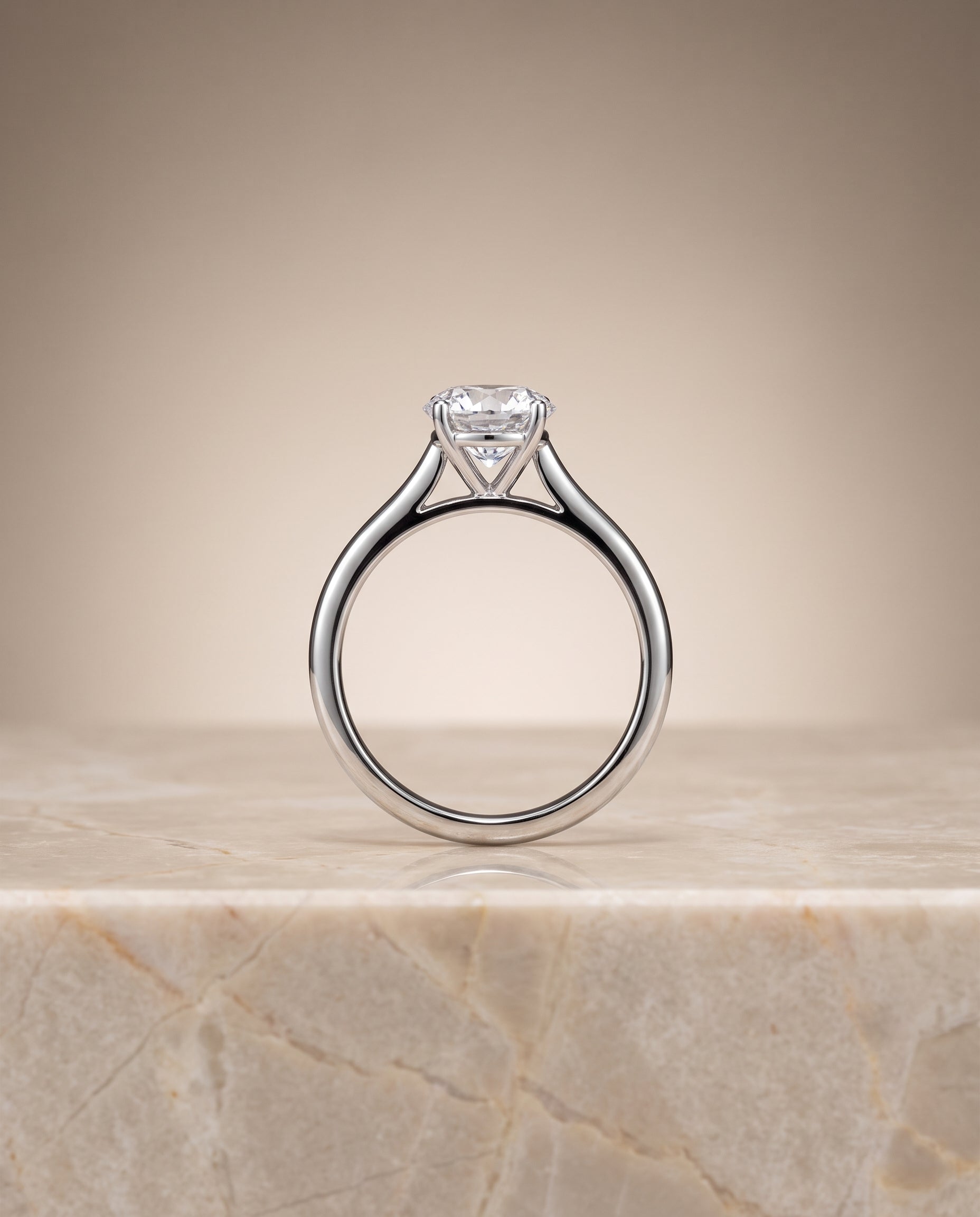 Pinched Cathedral Solitaire styling on The Gladys round engagement ring setting | RockHer