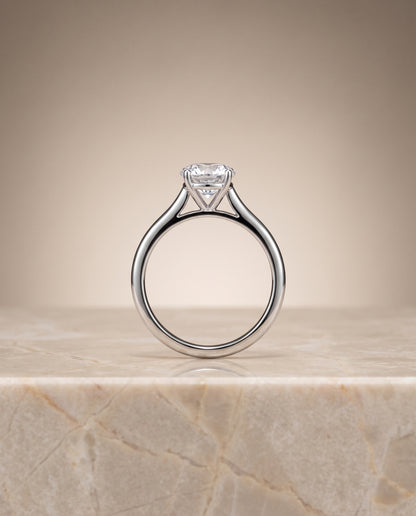 The Gladys Pinched Cathedral Solitaire Round Engagement Ring Setting in Platinum